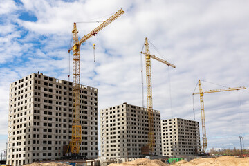 Russia. Saint-Petersburg. Construction of a multi-storey residential building. Construction equipment.