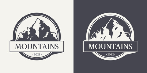 Obraz premium Vector Ventage Labels with Hand Drawn Mountains. 2022. Illustration for Ski Resort, Hiking, Climbing, Mountain Biking Logo Set. Drawing Winter Landscape, Camping Design