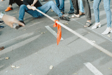 Royalty high quality free stock photo Unidentified a group of people playing a game of tug of war,...
