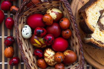easter eggs in basket. Colored pasta eggs. Red eggs. Traditional Easter eggs.