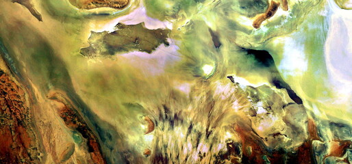 abstract landscape photo of the deserts of Africa from the air emulating the shapes and colors of...