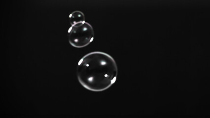 Soap bubble drop or Shampoo bubbles floating like flying in the air black background which represent refreshing moments and gentle soft. Bubbles drops for soap  shampoo or detergent product industry.