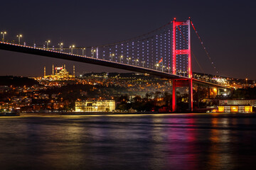 Fototapeta na wymiar Bosphorus bridge between Asia and Europe at night. Istanbul, Turkey.