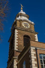 Fototapeta na wymiar Tower of the former St. Johns Church in Wapping, London, UK