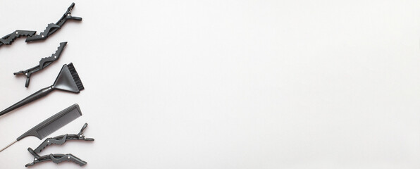 various hairdressing tools on a gray background. beauty salon concept