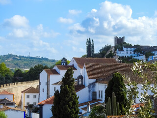 Obidos, Portugal.  View of the town, the medieval walls, and historic houses