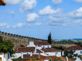 Obidos, Portugal.  View of the town, the medieval walls, and historic houses