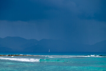 Fototapeta premium Shaol Bay West beach during a rainy afternoon at Anguilla