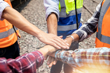 Professional of diversity engineer team show hands meeting together in workplace, Unity is the power of success, Image panorama for cover digital design. Successful projects
