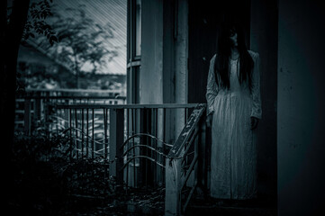 Portrait of asian woman make up ghost,Scary horror scene for background,Halloween festival concept,Ghost movies poster