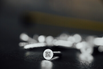 Closeup shot of drywall screw double bugle heads on an isolated background