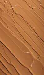 bb cream foundation texture . Close up beauty make up. Sand tones foundation