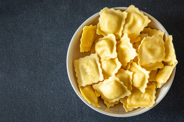 pasta ravioli stuffed square shape italian dish fresh meal food snack on the table copy space food background rustic top view