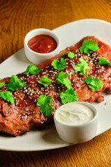 Grilled and smoked ribs with barbeque
