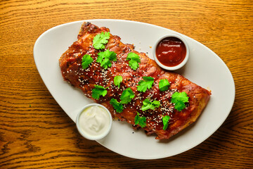 Grilled and smoked ribs with barbeque