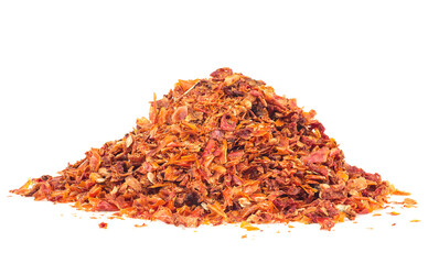Pile of dried and chopped tomatoes isolated on a white background. Tomato flakes.