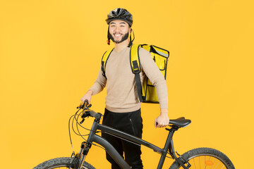 Asian delivery man with bicycle and backpack delivering packages