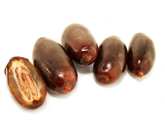 Fresh royal big dates  around  white background. close up