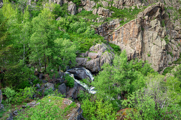 Obraz premium The Southern Urals. Irendyk ridge - Khudolaz river and Gadelsha waterfall.