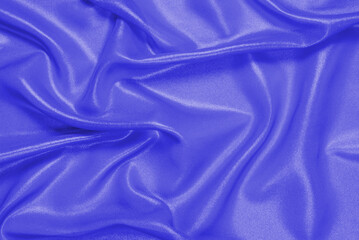 Purple silk or satin luxury fabric texture can use as abstract background.