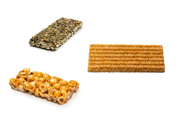 Bar with nuts isolated on a white background. Hazelnut bar.