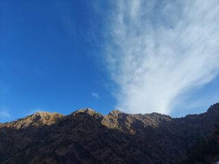 Fototapeta na wymiar Sunlight falling on mountains peak in India.
