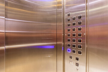 Buttons in the elevator of a multi-storey building with Braille