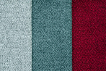 Fototapeta premium Grey, blue, red background. set of multi-colored dense fabrics of uniform texture. choice of materials in different colors. vertical fragments.