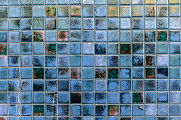 Fragment of glazed ceramic tiled wall