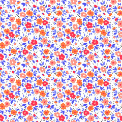 Seamless floral pattern. Ditsy background of small red and orange flowers and blue leaves. Small-scale flowers scattered over a white background. Vintage template for fashion prints. Stock pattern.