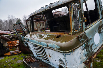 Abandoned cab of an old rotten rusty soviet truck. Recycling scrap