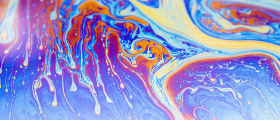 Macro photo of the texture of a soap bubble. Psychedelic patterns