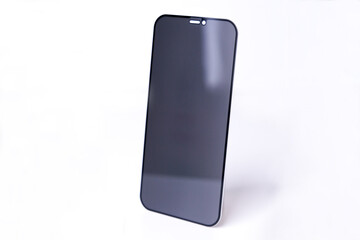 Protective glass for smartphone screen on white background