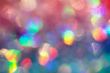 Abstract defocused pink and blue background with shining glitter.Good as overlay layer.