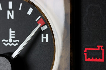 Naklejka premium coolant warning light in car dashboard