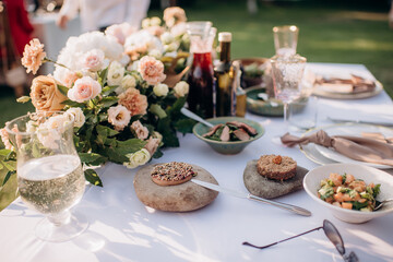 served banquet table with fresh dishes with food