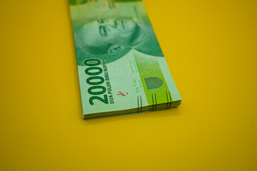 IDR 20,000 yellow isolated. Rp20,000 Bank Indonesia money.                               
