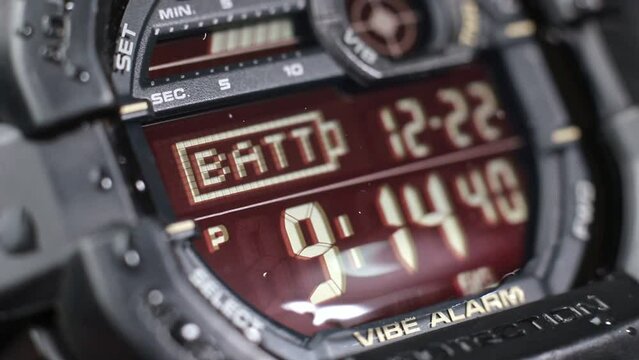 Macro close up of a tactical digital watch face functioning
