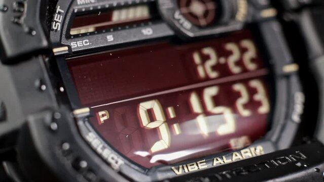 Macro close up of a tactical digital watch face functioning
