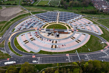 Aerial view of an innovative Park and Ride location with innovative solar panels on air park...