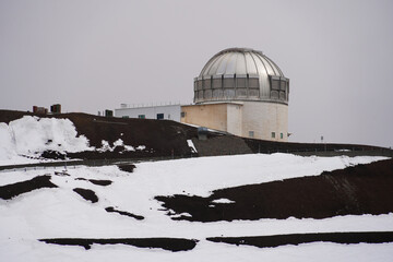 Shiny dome of the United Kingdom's infrared telescope at the summit of the Mauna Kea volcano on the...