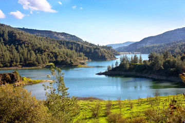 Mediterranean landscape - view of the Arminou Reservoir on the Dhiarizos River at the Troodos Mountains in the Paphos District, Republic of Cyprus