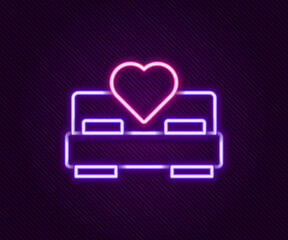 Glowing neon line Bedroom icon isolated on black background. Wedding, love, marriage symbol. Bedroom creative icon from honeymoon collection. Colorful outline concept. Vector