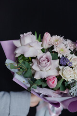 Stylish bouquets on a black background. rose maritim