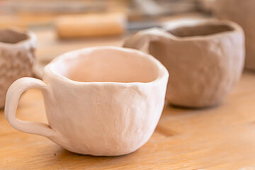 Fototapeta na wymiar Ready ceramic handmade crockery. Art concept.