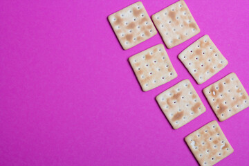 cracker cookies on a pink background