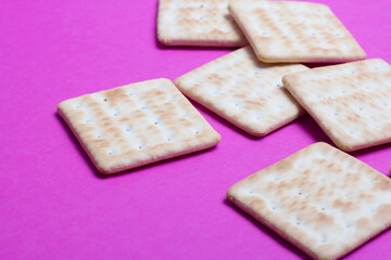 cracker cookies on a pink background