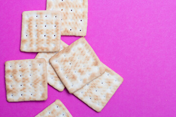 cracker cookies on a pink background