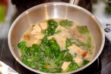 Roasted wild mushrooms on cooking pan. Fried of porcini mushrooms in frying pan