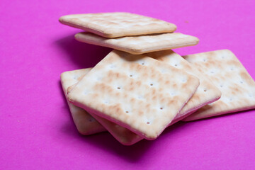 cracker cookies on a pink background